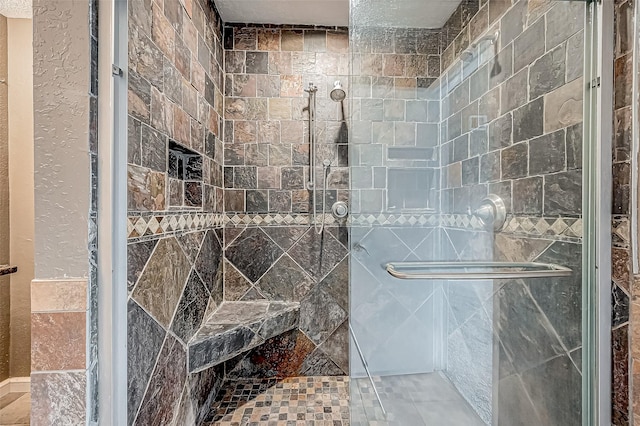 bathroom with an enclosed shower