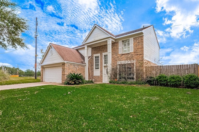 view of front of house featuring a front lawn and a garage