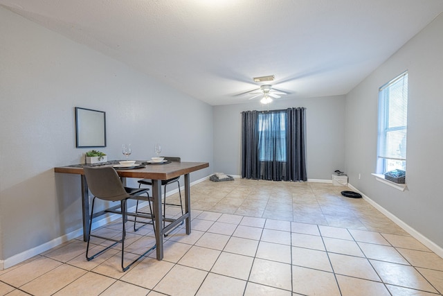 tiled office space with ceiling fan