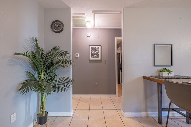 interior space featuring light tile patterned floors