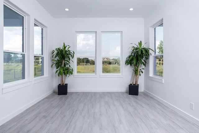 unfurnished room featuring light wood-type flooring