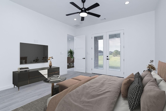 bedroom featuring access to exterior, ceiling fan, french doors, and hardwood / wood-style flooring