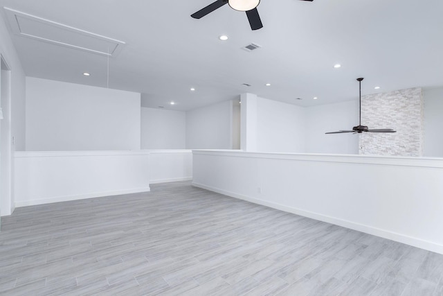 unfurnished room featuring ceiling fan and light hardwood / wood-style floors