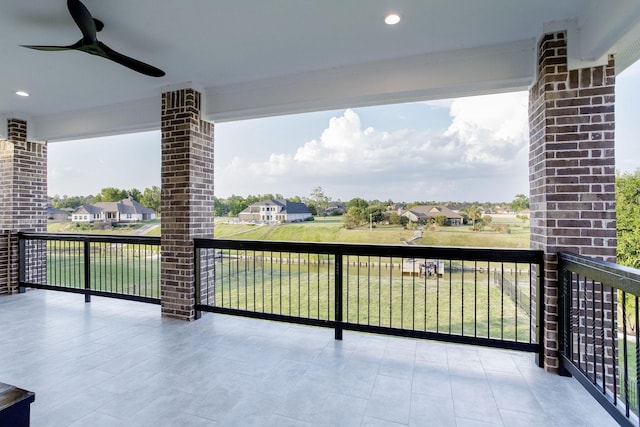 balcony featuring ceiling fan