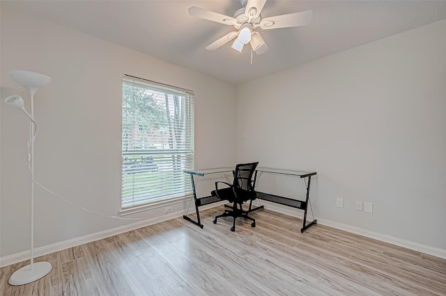 home office featuring ceiling fan and light wood-type flooring