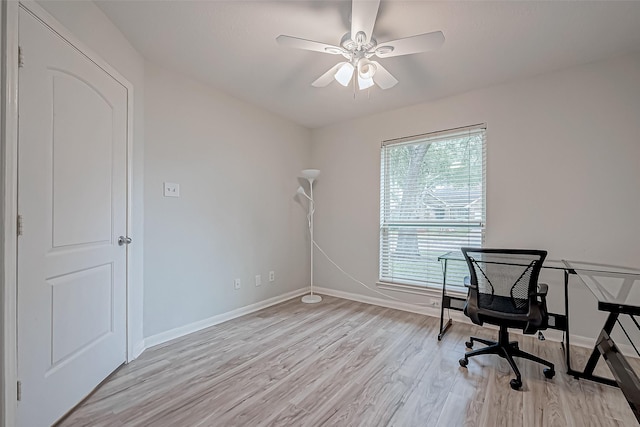 office with ceiling fan and light hardwood / wood-style floors