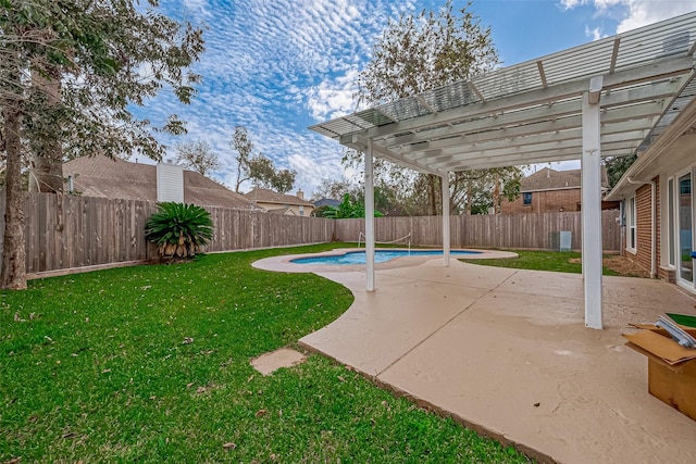 view of yard featuring a pergola, a fenced in pool, and a patio area