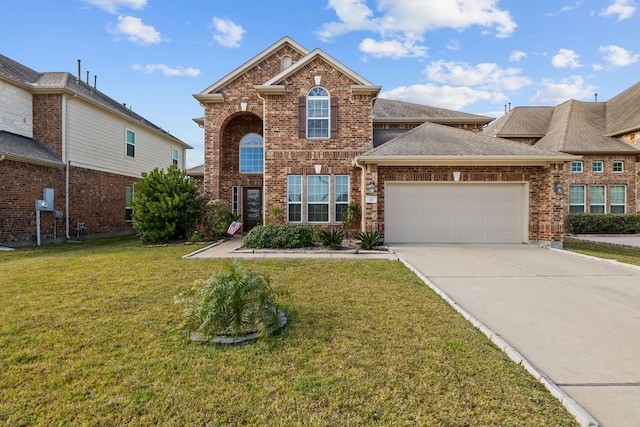 view of property featuring a garage and a front lawn