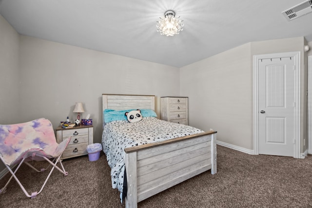 bedroom featuring dark carpet