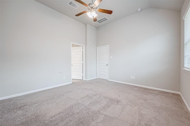 unfurnished room featuring ceiling fan, high vaulted ceiling, and light colored carpet