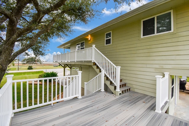 deck featuring a yard