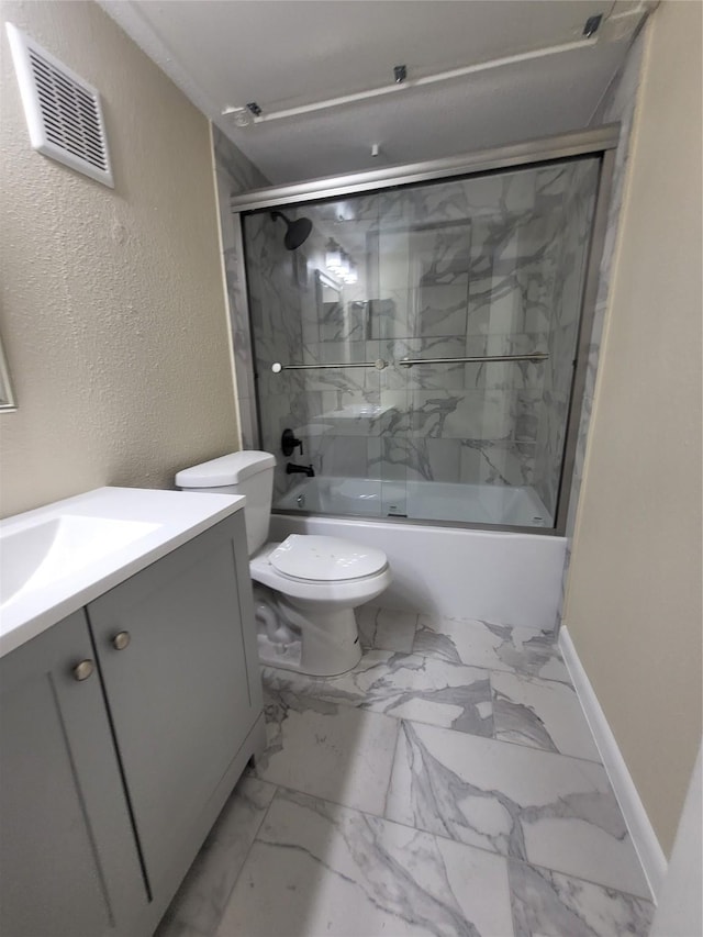 bathroom with toilet, shower / bath combination with glass door, visible vents, vanity, and marble finish floor