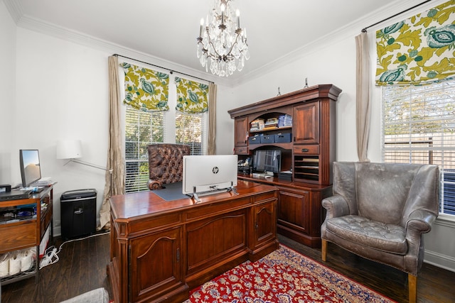 home office with plenty of natural light, dark hardwood / wood-style flooring, ornamental molding, and a chandelier