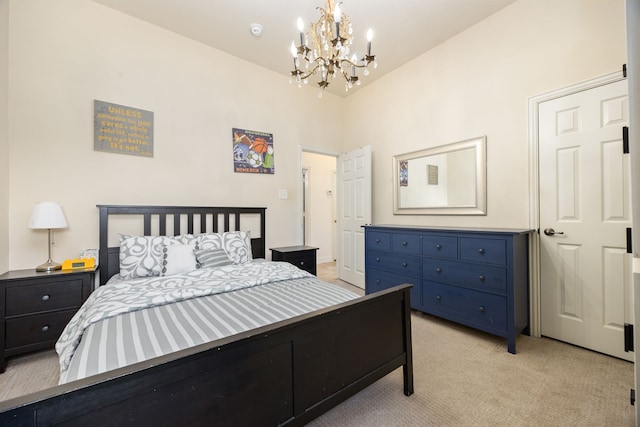 carpeted bedroom with a chandelier and vaulted ceiling