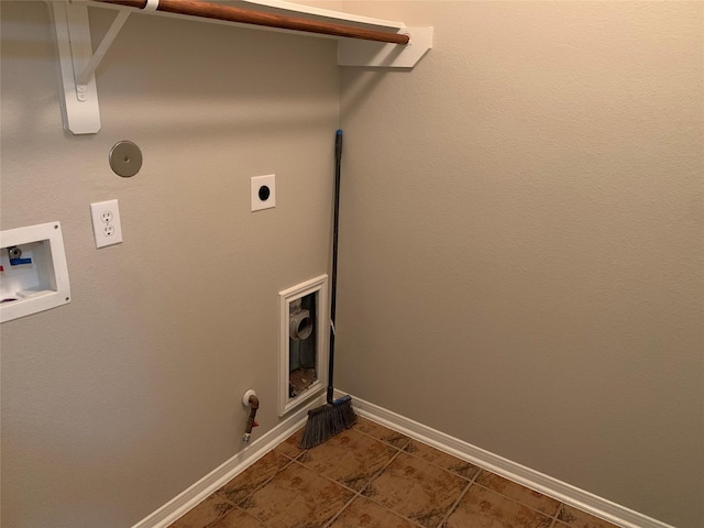 laundry area with hookup for an electric dryer, hookup for a washing machine, and gas dryer hookup