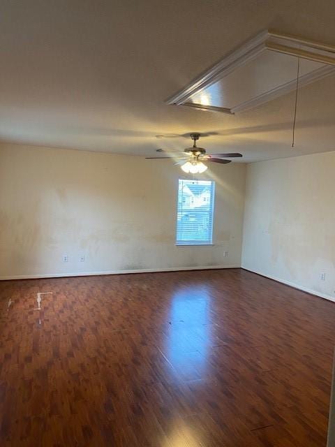 empty room featuring dark wood-type flooring