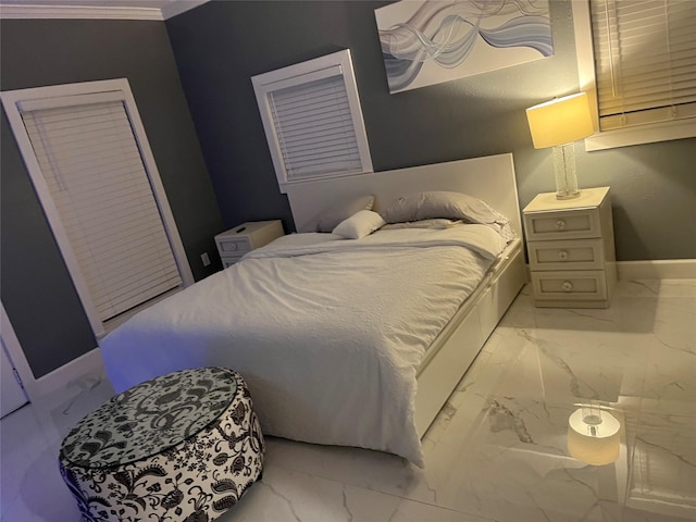 bedroom featuring ornamental molding