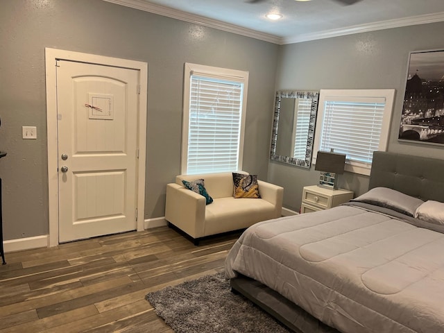 bedroom featuring dark hardwood / wood-style flooring and ornamental molding