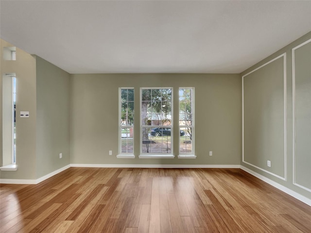 empty room featuring light hardwood / wood-style floors