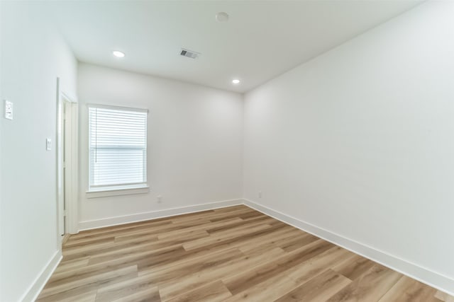 unfurnished room featuring light wood-type flooring