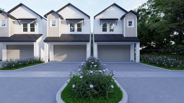 view of front of home with a garage