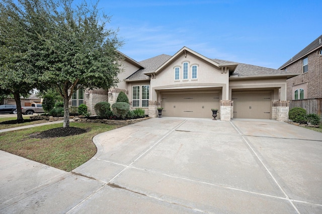 view of front of property with a garage