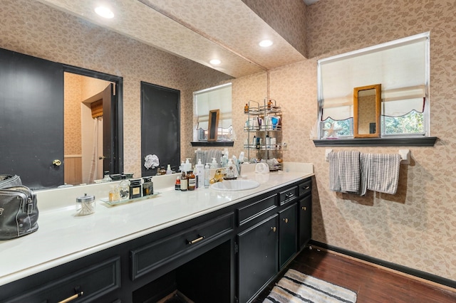 bathroom featuring wood-type flooring and vanity