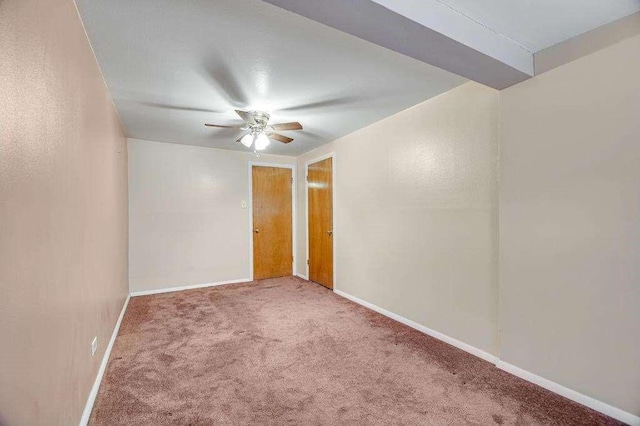 carpeted empty room with ceiling fan