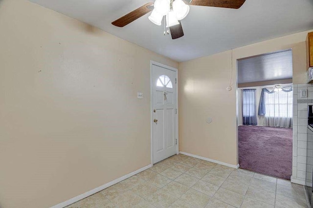 entryway featuring ceiling fan and a healthy amount of sunlight