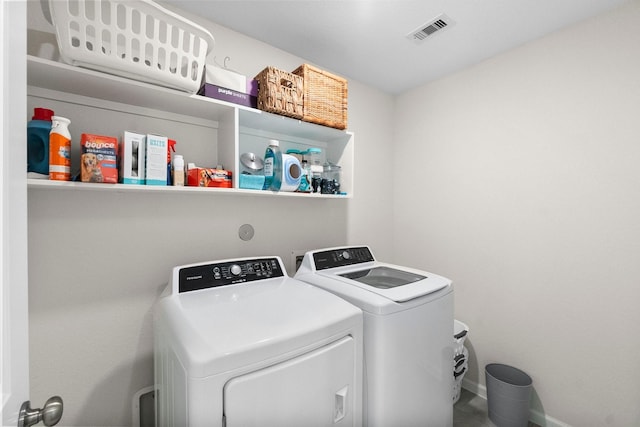 laundry area with washer and dryer