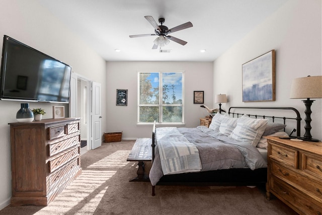 bedroom with light carpet and ceiling fan