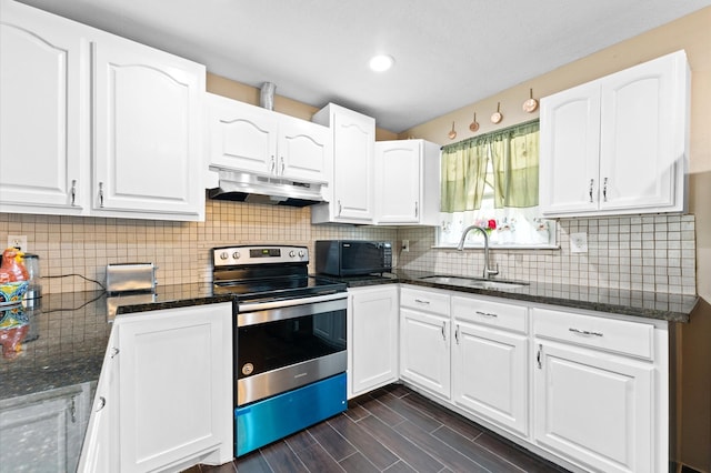 kitchen with tasteful backsplash, dark wood-type flooring, sink, white cabinetry, and stainless steel electric range