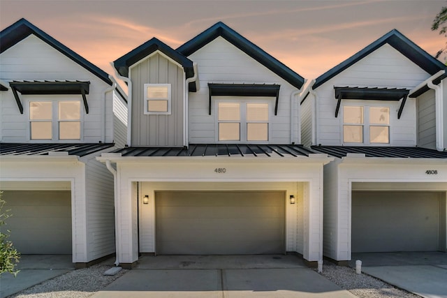 view of front of home with a garage