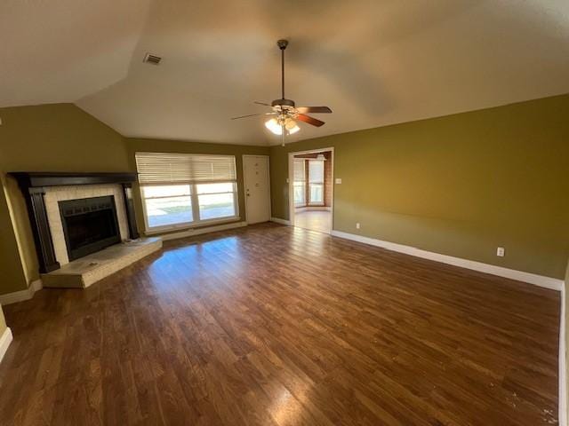 unfurnished living room with ceiling fan, dark hardwood / wood-style flooring, and lofted ceiling