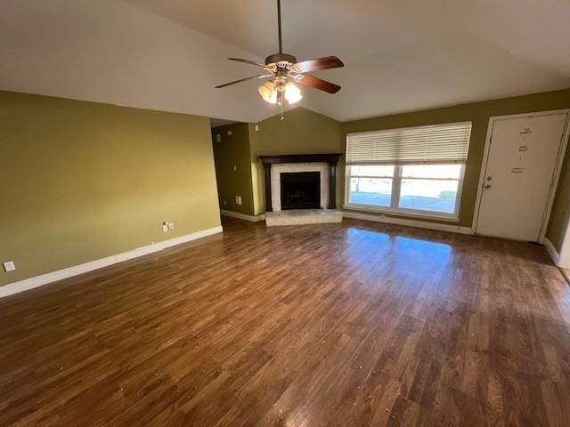 unfurnished living room featuring ceiling fan, dark hardwood / wood-style flooring, and lofted ceiling