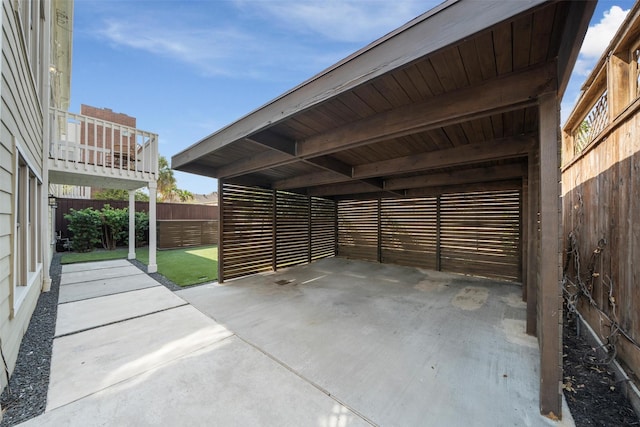 exterior space featuring a carport