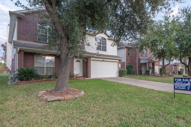 front facade with a front lawn and a garage