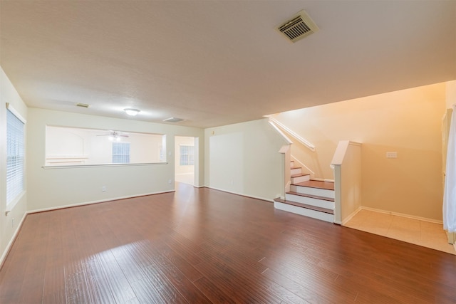 interior space featuring ceiling fan and wood-type flooring