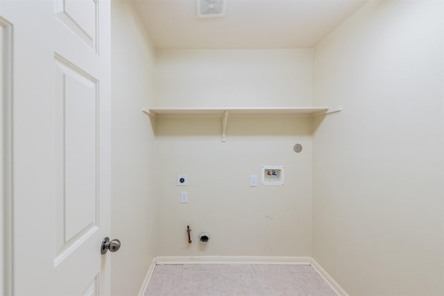 laundry room featuring hookup for an electric dryer, gas dryer hookup, light tile patterned floors, and hookup for a washing machine