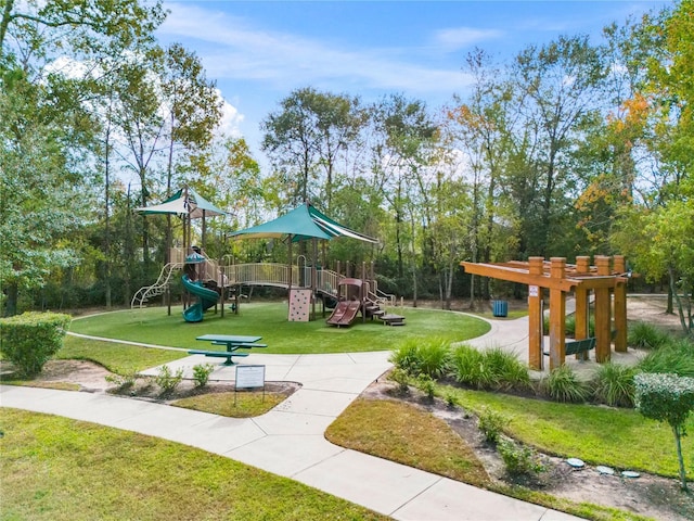 view of playground featuring a lawn