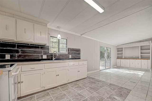 kitchen with decorative light fixtures, white range with electric cooktop, a healthy amount of sunlight, and sink