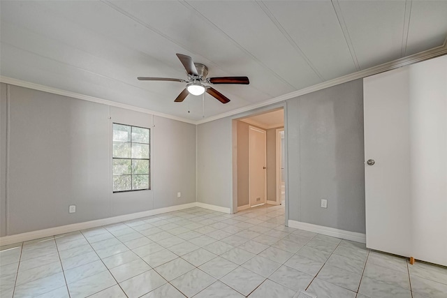 empty room featuring ceiling fan and crown molding