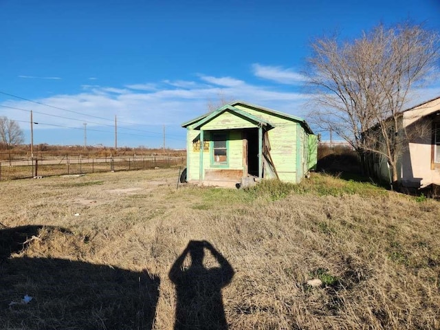 view of outdoor structure with a rural view