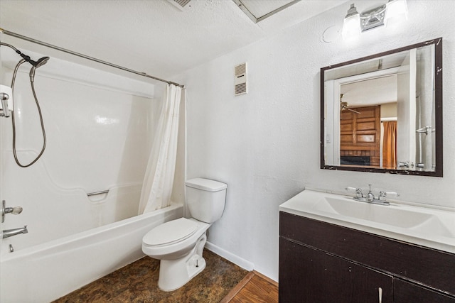 full bathroom with shower / bath combination with curtain, vanity, a textured ceiling, wood-type flooring, and toilet