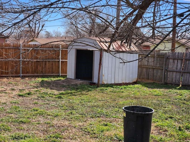 view of outdoor structure featuring a lawn