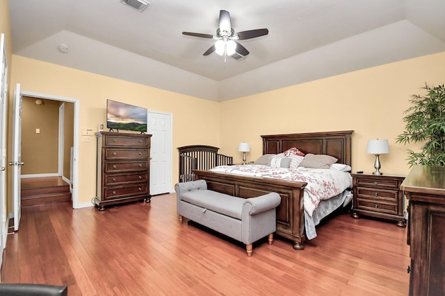 bedroom with ceiling fan and hardwood / wood-style floors