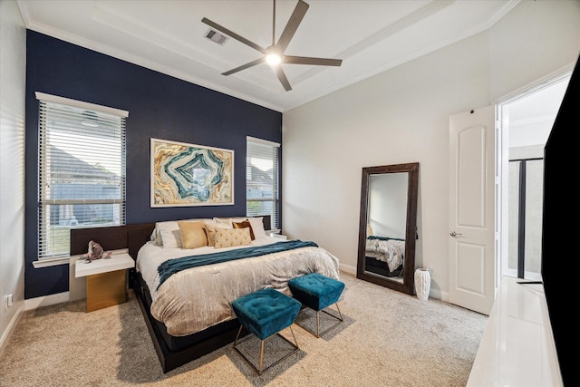 carpeted bedroom with ceiling fan and crown molding