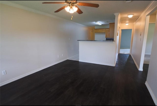 unfurnished living room featuring ornamental molding, dark wood-type flooring, and ceiling fan