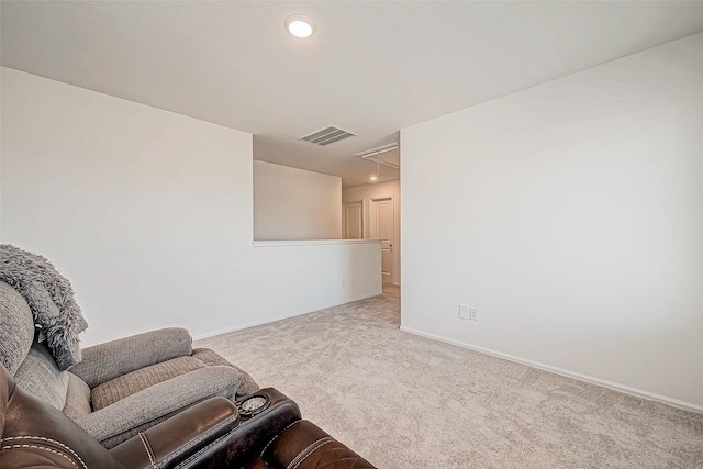 sitting room with carpet flooring