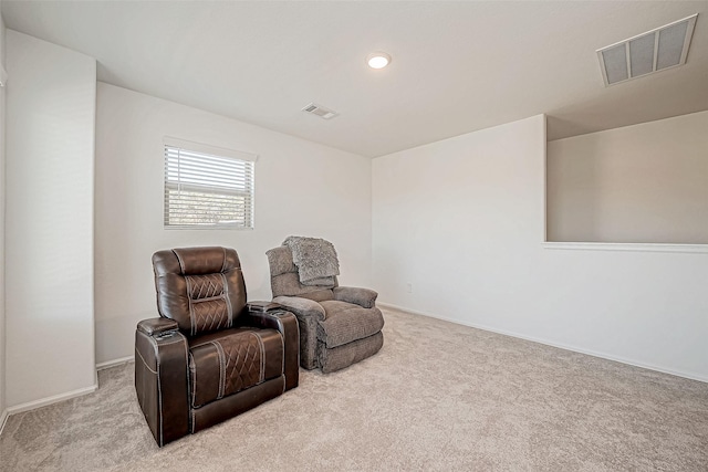 sitting room with light carpet